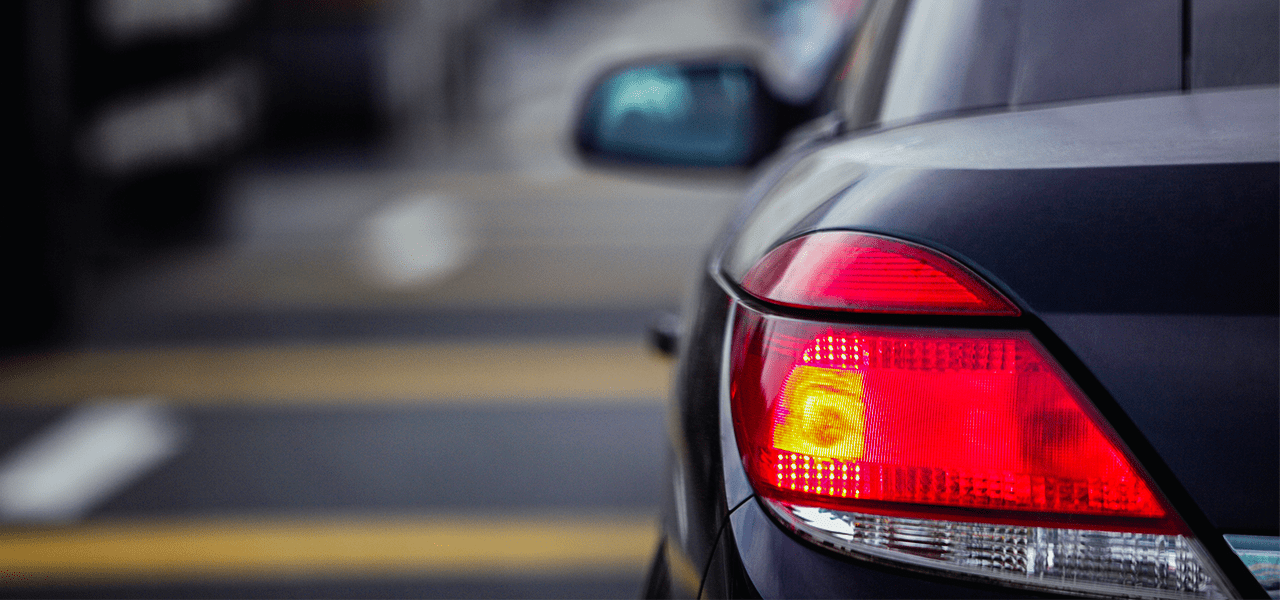Close-up view of a car's left tail light.