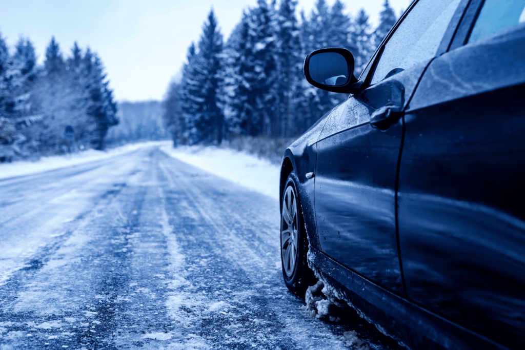 Car driving on highway during winter