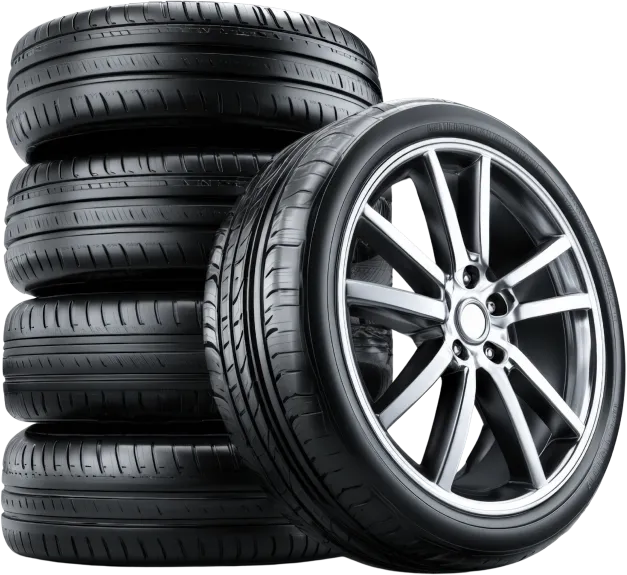 Stack of new tires, with one tire mounted on a rim, ready for use on a vehicle