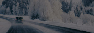 Car driving on snowy road